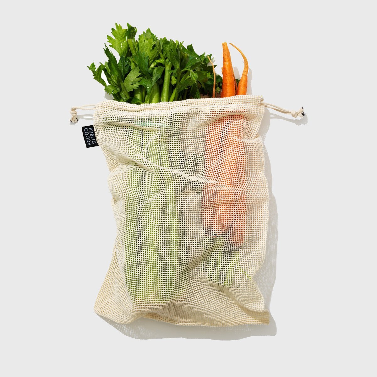 Mesh bags with reusable glass water bottle. Sustainable lifestyle. Zero  waste concept. No plastic. Stock Photo by FabrikaPhoto